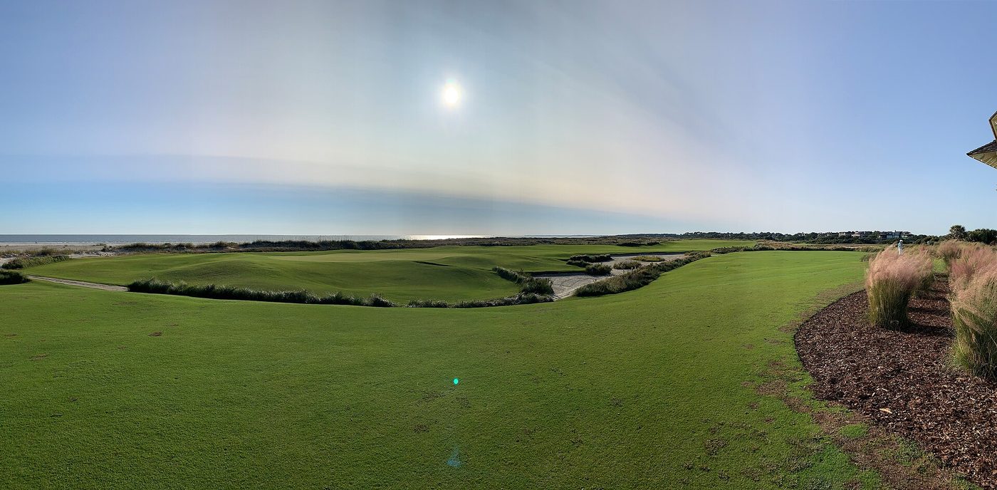 The 18th green of the Ocean Course at Kiawah Island with the Atlantic beach behind it
