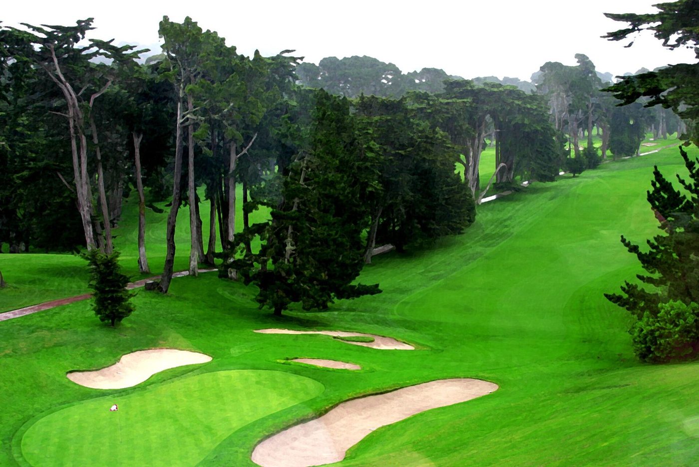 Bunkers around the 18th green of the Olympic Club's Lake Course framed by cypress and pine in San Francisco