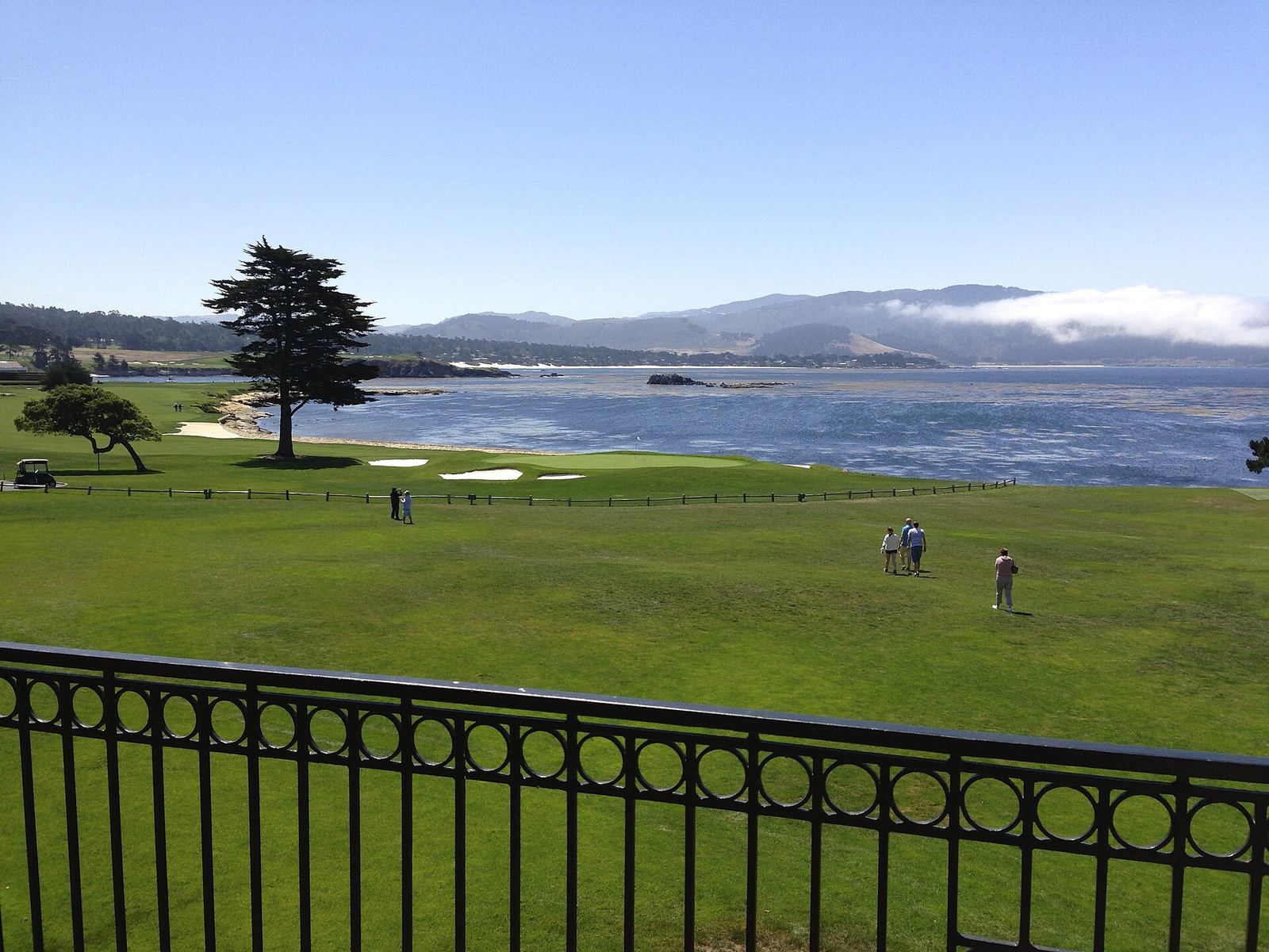 The 18th green at Pebble Beach, the highest-ranked of the best golf courses in America that the public can book