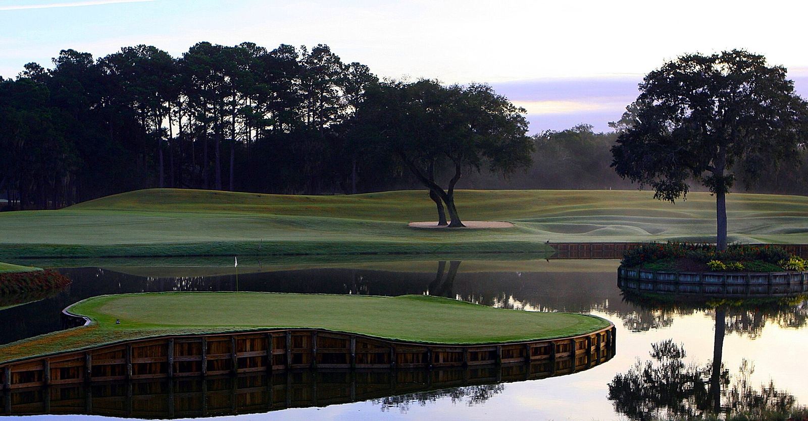 The island-green 17th on the TPC Sawgrass Stadium Course at dawn, the most famous hole among the best golf courses in Florida